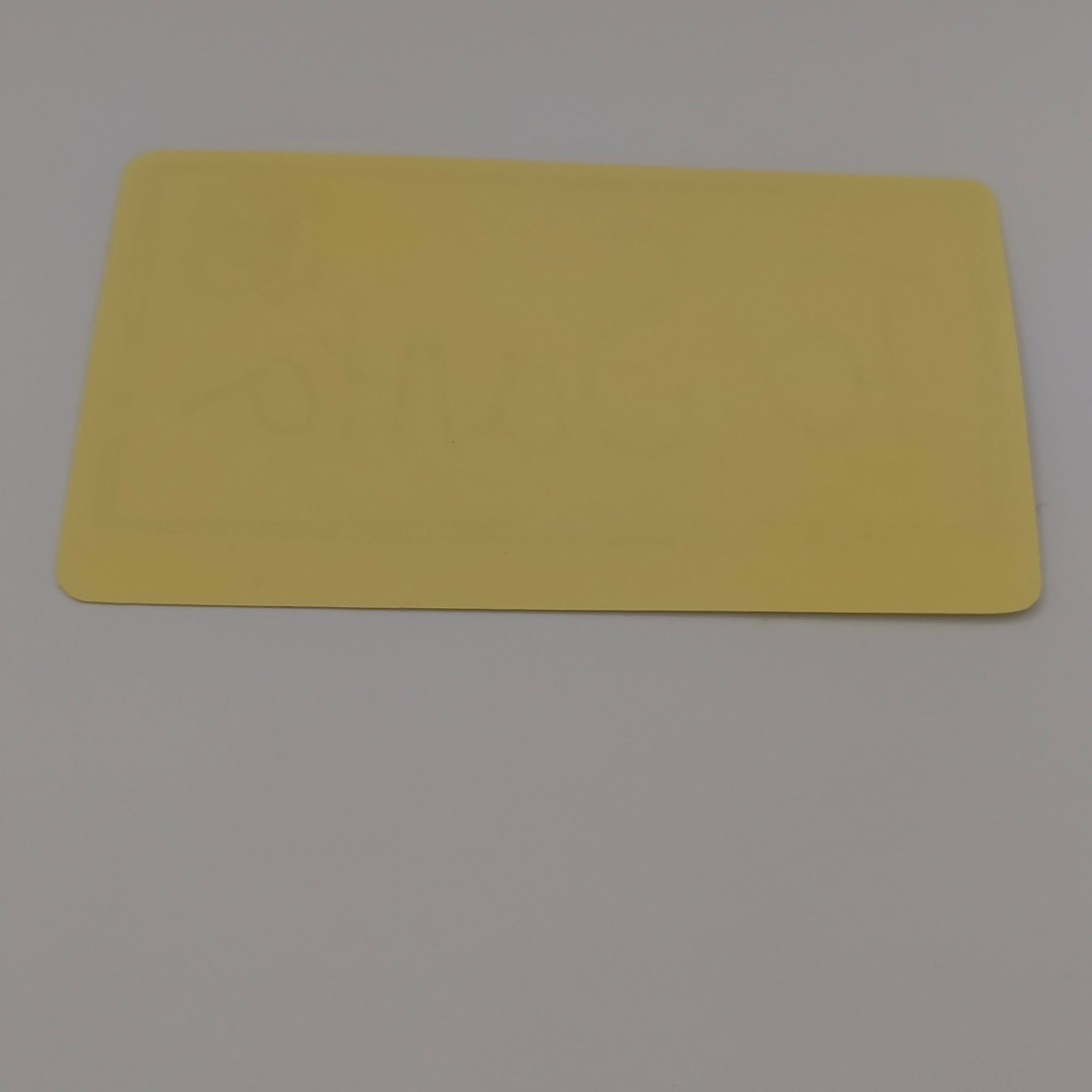 Back view of To Santa Christmas sticker showing plain yellow adhesive backing