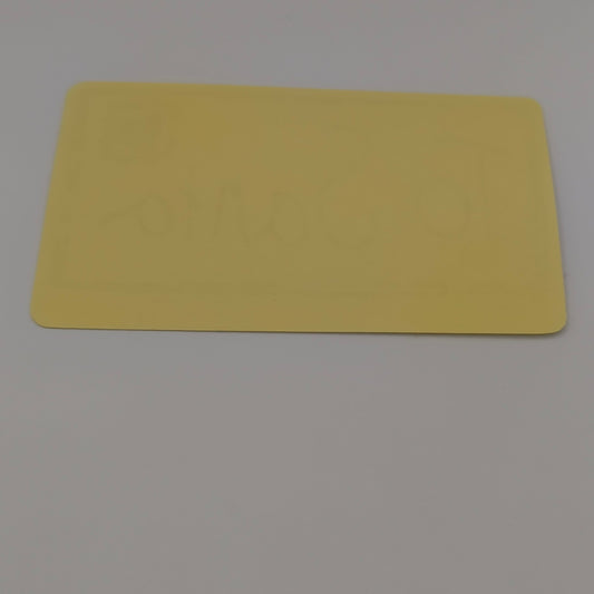 Back view of To Santa Christmas sticker showing plain yellow adhesive backing