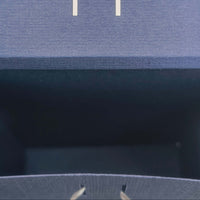 Top view inside navy Ganesh gift box showing slots for ribbon closure, handmade for Hindu celebrations and festive gifting.