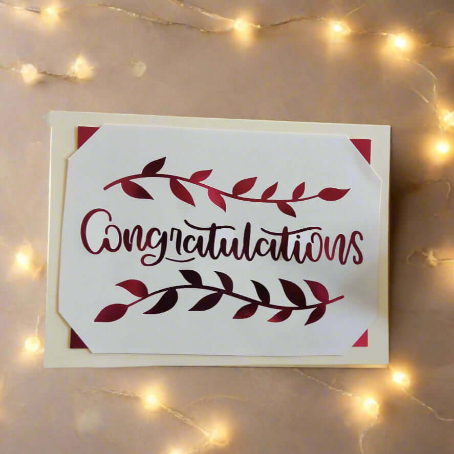 Congratulations card featuring a burgundy leaf design, ideal for graduations or new job gifts.