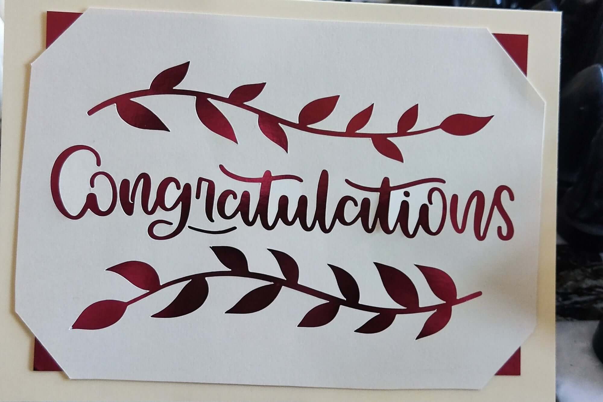 Congratulations Card with burgundy leaf design for graduation or new job gift.