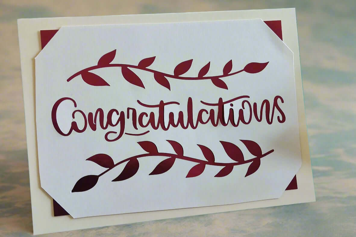 Congratulations card with burgundy leaf design, perfect for graduation or new job gift.