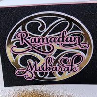 Glittery Ramadan Mubarak card, featuring elegant pink lettering on a black background, ideal for Islamic greetings.