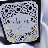 Happy Eid Card featuring laser cut Islamic geometric design, perfect for Muslim celebration greetings.