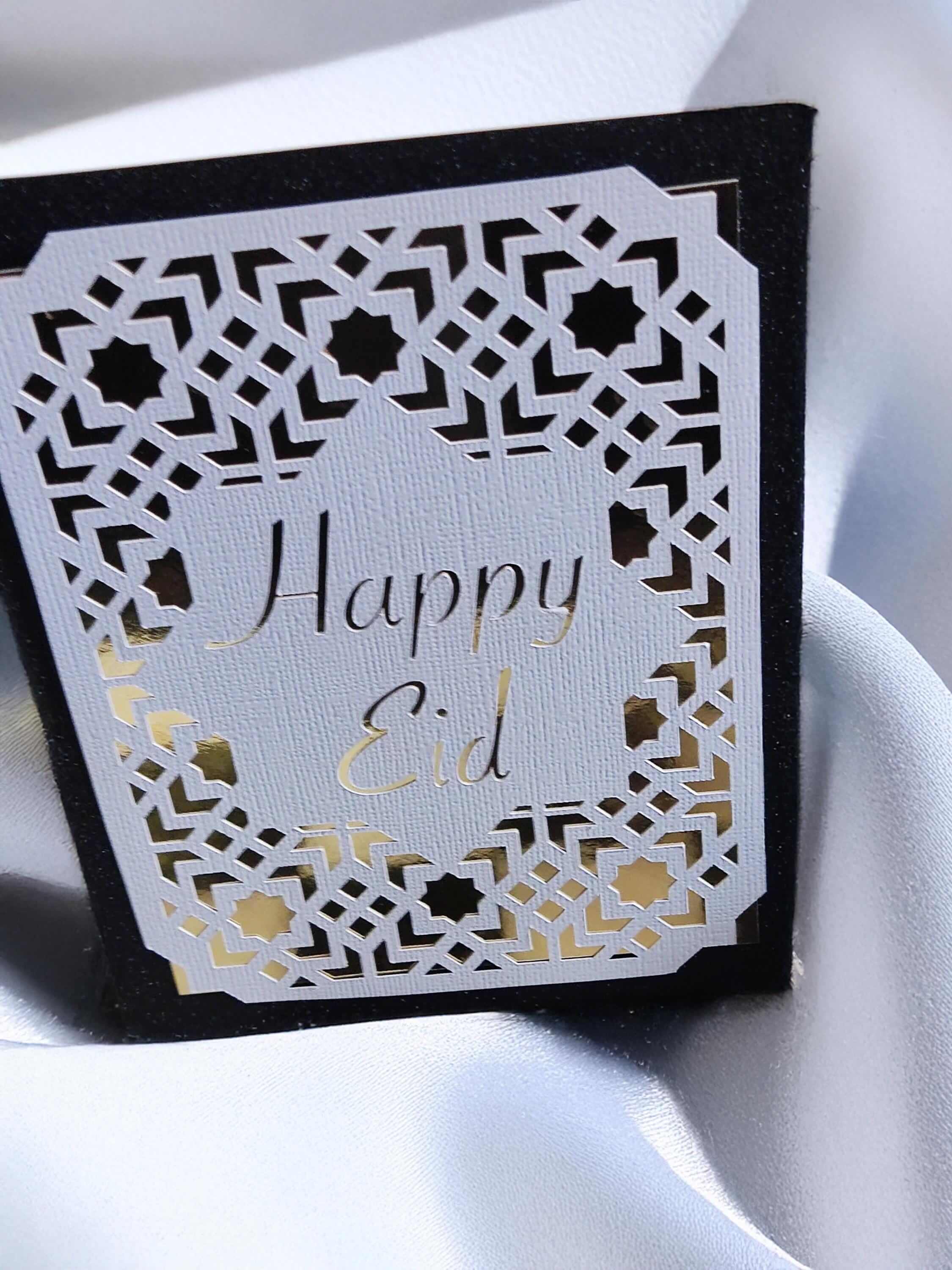 Happy Eid Card featuring laser cut Islamic geometric design, perfect for Muslim celebration greetings.