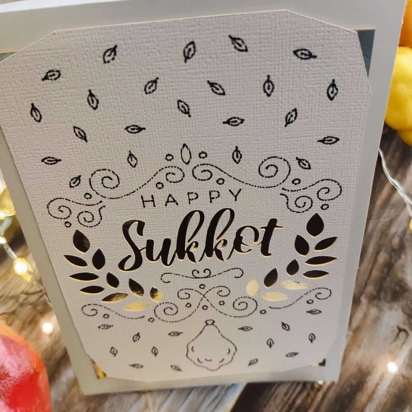 Handmade Happy Sukkot greeting card featuring intricate ink details and gold accents.