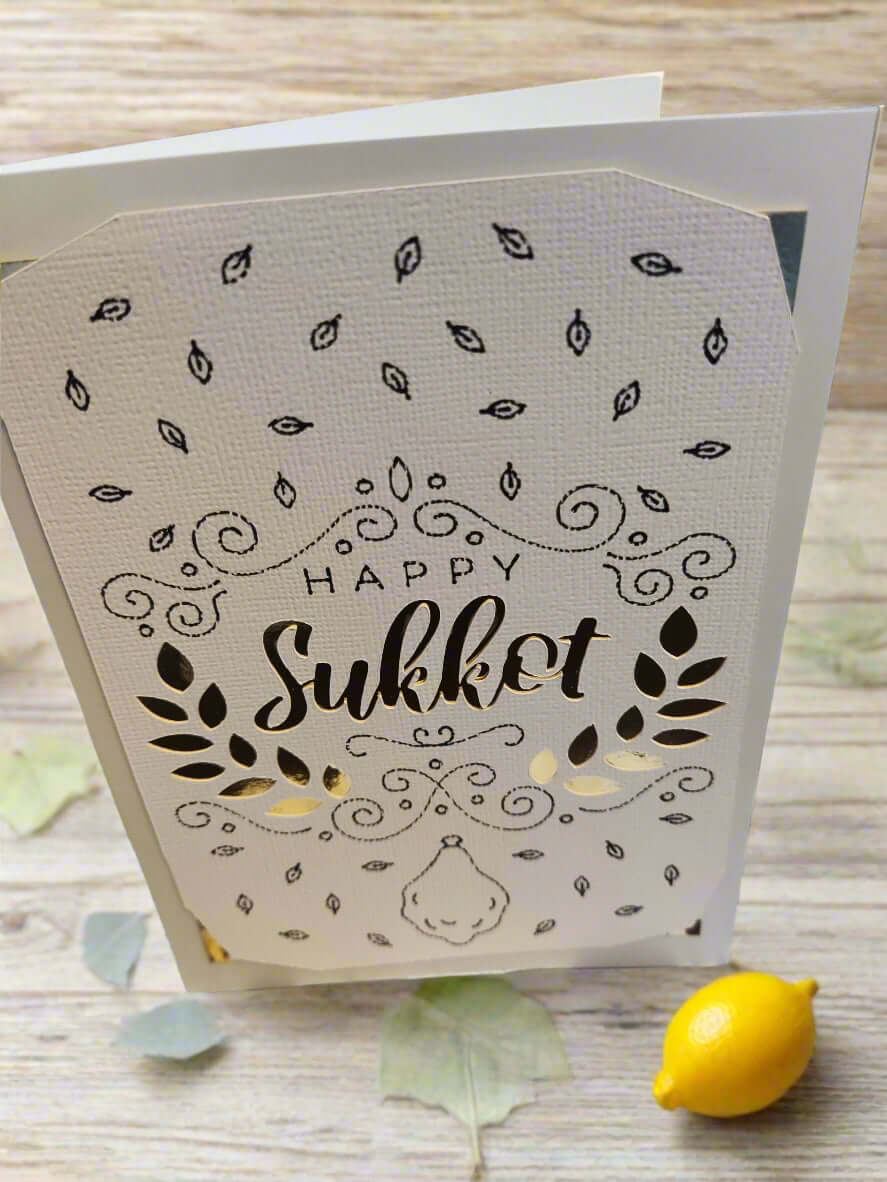 Handmade Happy Sukkot greeting card with intricate designs and gold accents.
