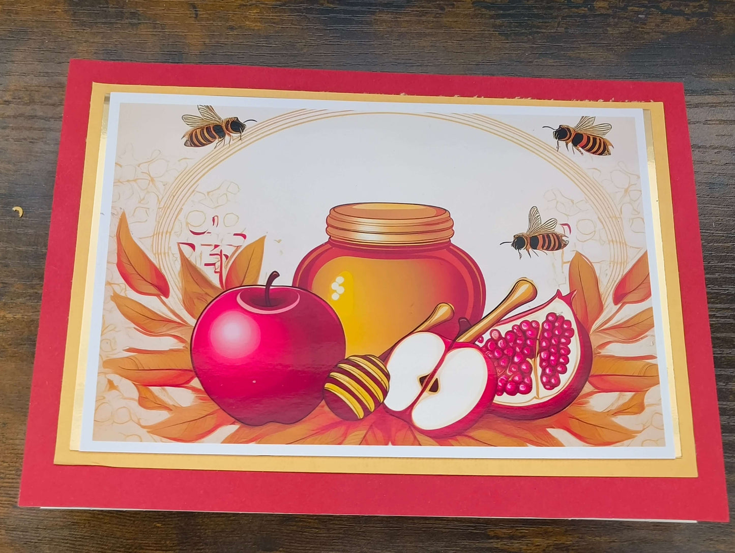Vibrant Rosh Hashanah card featuring honey, apples, pomegranate, and bees, perfect for personalised Jewish New Year greetings.