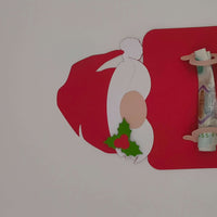 Personalised Santa money holder card with a banknote, featuring Santa hat and holly detail, perfect for Christmas gifting.