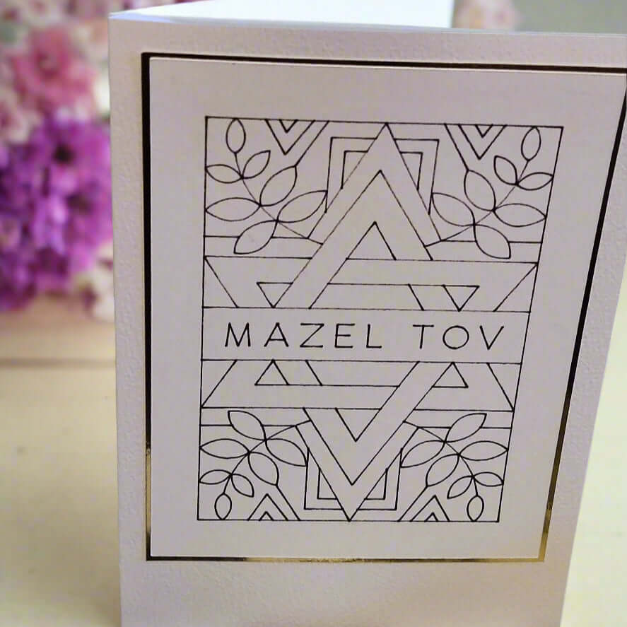 Handmade Star of David Mazel Tov card featuring elegant geometric design and floral accents, perfect for Jewish celebrations.