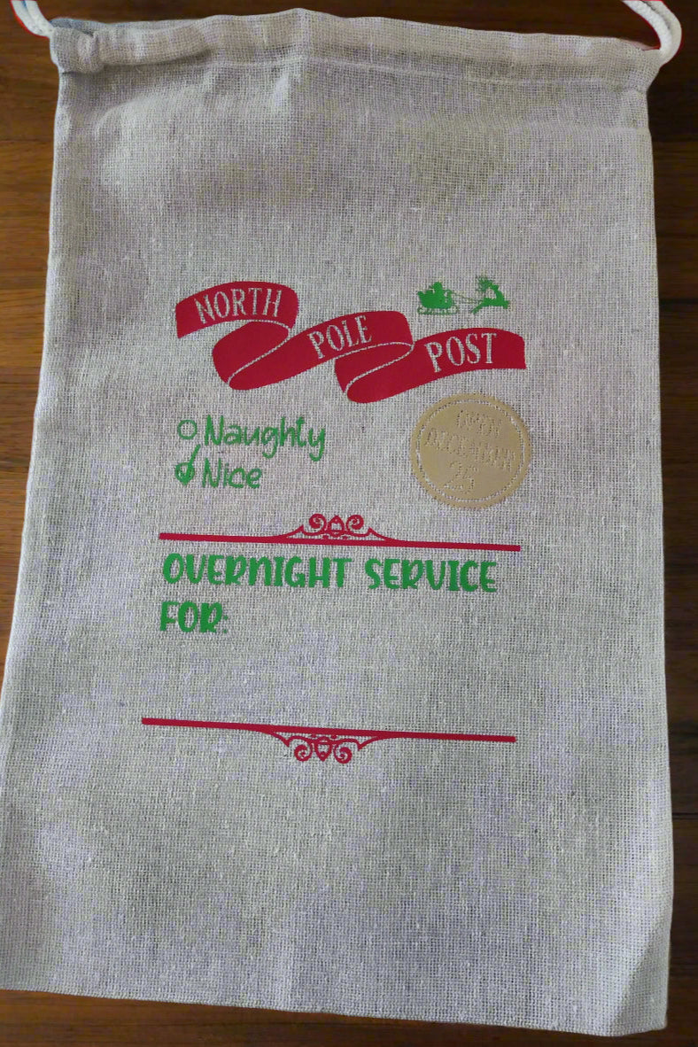 North Pole Santa Delivery Sack featuring 'Overnight Service For' design, ideal for personalised Christmas gifting.