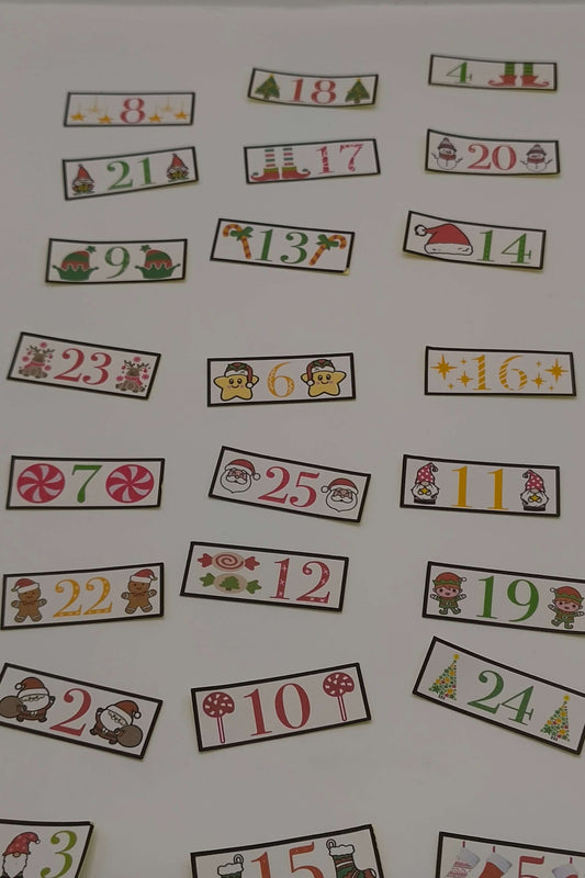 Festive advent number labels featuring stars, Santa hats, snowmen, and Christmas icons