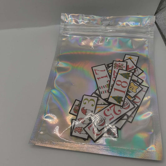 Advent calendar labels set packaged in silver holographic resealable bag