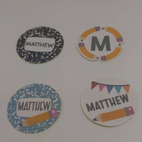 Personalised school name stickers featuring playful designs and names, perfect for kids' supplies organization.