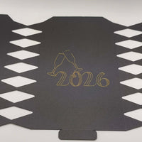 Personalised New Year cracker design featuring 2026 in gold with champagne glasses decoration.