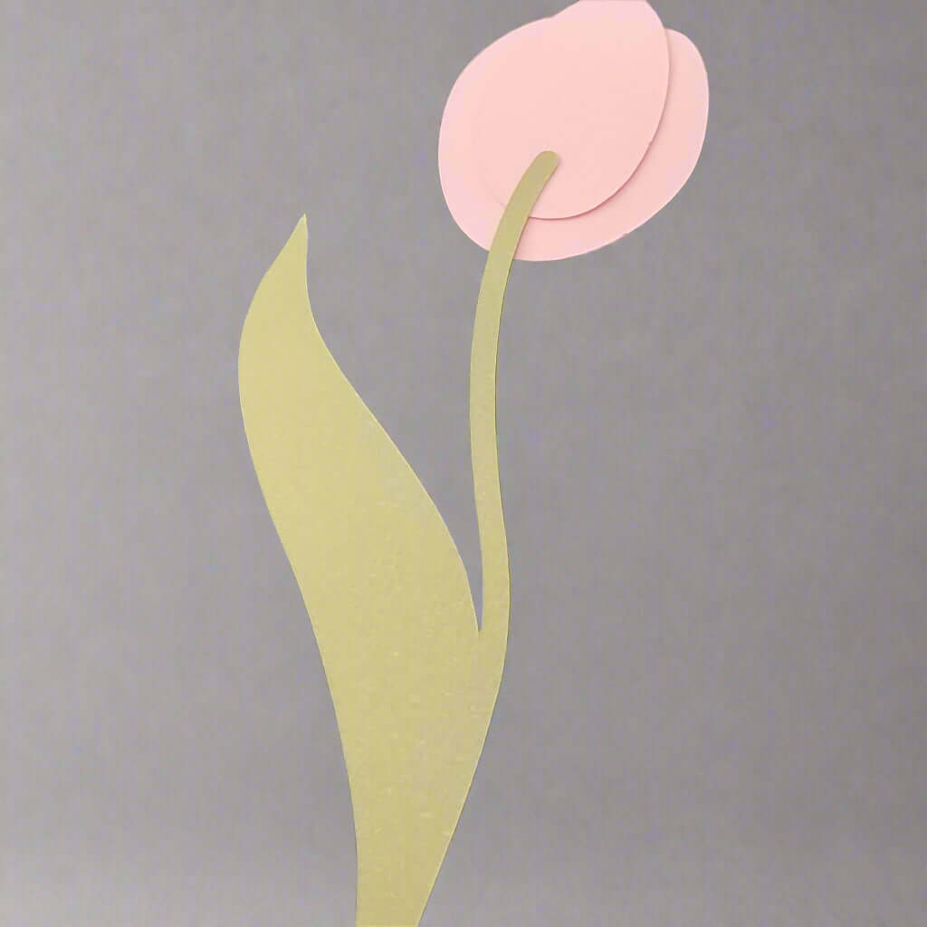 Blank tulip-shaped place card in pastel pink and light green cardstock, shown without personalisation on a neutral background.