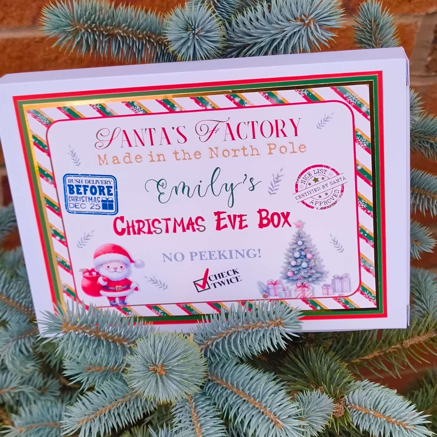Personalised Christmas Eve box set with Santa's Factory label for kids' Christmas magic.