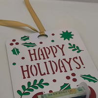 Christmas Happy Holidays card with gold ribbon and money holder slot for gifting.