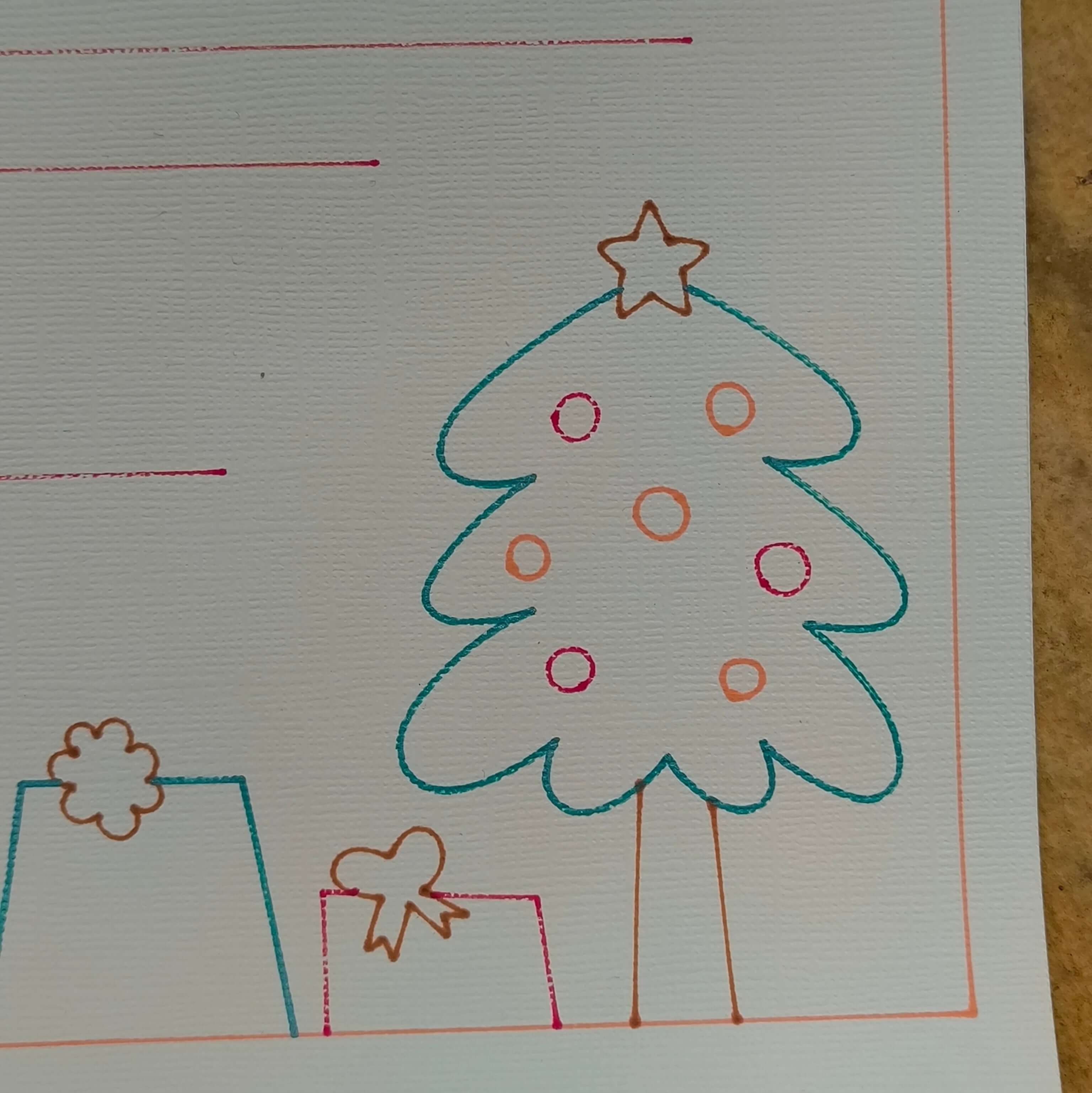 Illustrated Christmas tree and gifts on personalised Father Christmas letter template for kids.