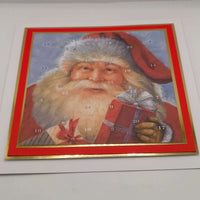Classic Santa Claus Advent Calendar with red and gold border, shown close-up on a white background to highlight design details and numbered doors.