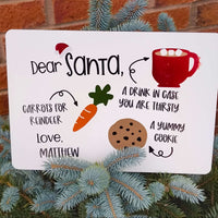 Personalised Santa Treat Board featuring a message for Santa with cookie, drink, and carrots for reindeer.