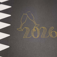 Personalised New Year cracker design featuring 2026 with champagne glasses on a black background.