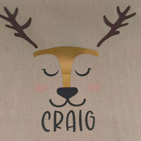 Personalised reindeer gift sack featuring a cute reindeer face and the name 'Craig' in bold black letters.