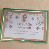 Handmade Eid al-Adha greeting card featuring gold accents and festive designs, perfect for celebrating the holiday.