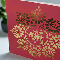 Red and gold Diwali greeting card with laser-cut floral patterns and 'Shubh Diwali' blessing, perfect for Hindu festival celebrations