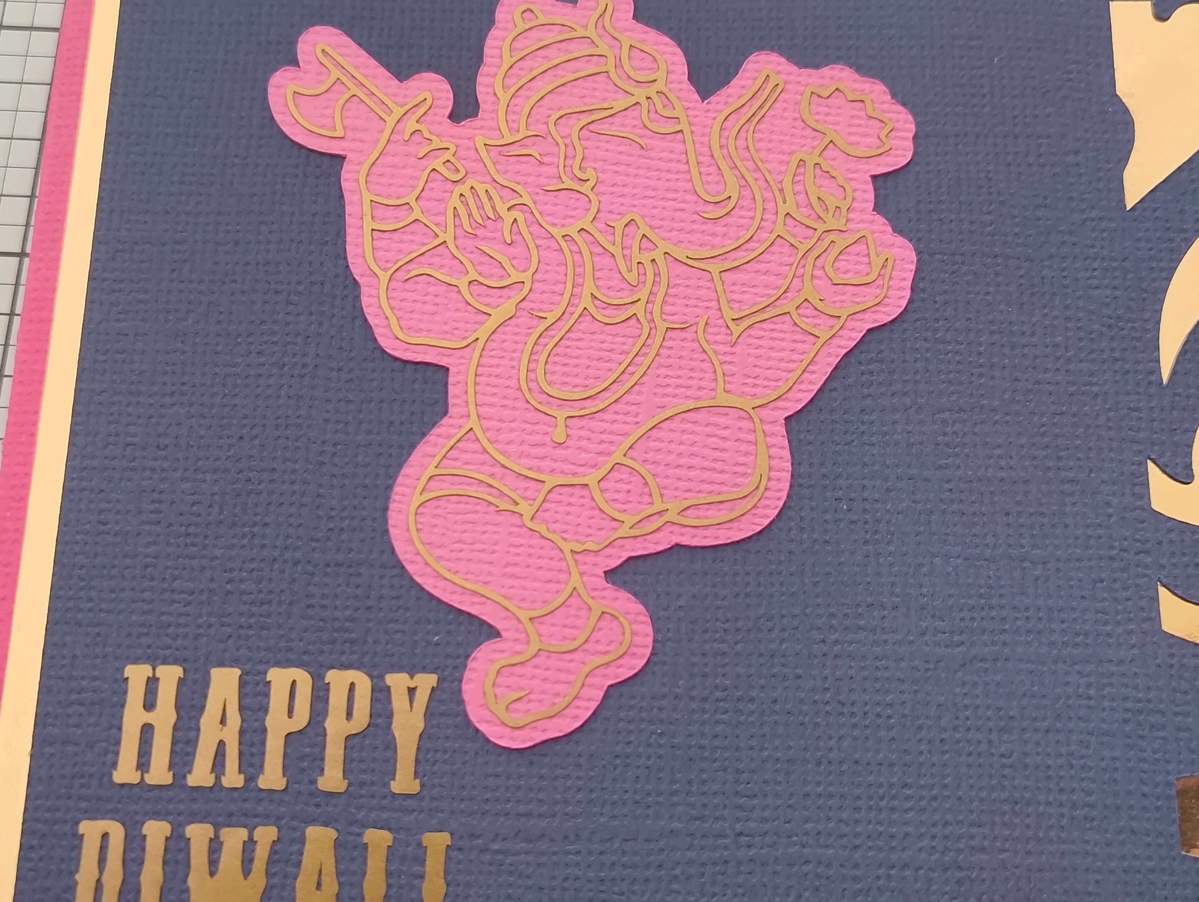 Happy Diwali greeting featuring Ganesha design in pink and gold, perfect for festival gifting.