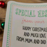 Elf Special Message Sticker with red and green festive border, holly sprig, and custom printed Christmas greeting from parents