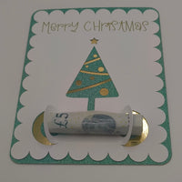 Festive money gift card with scalloped edges, glitter green Christmas tree, and gold accents, designed to hold rolled notes.