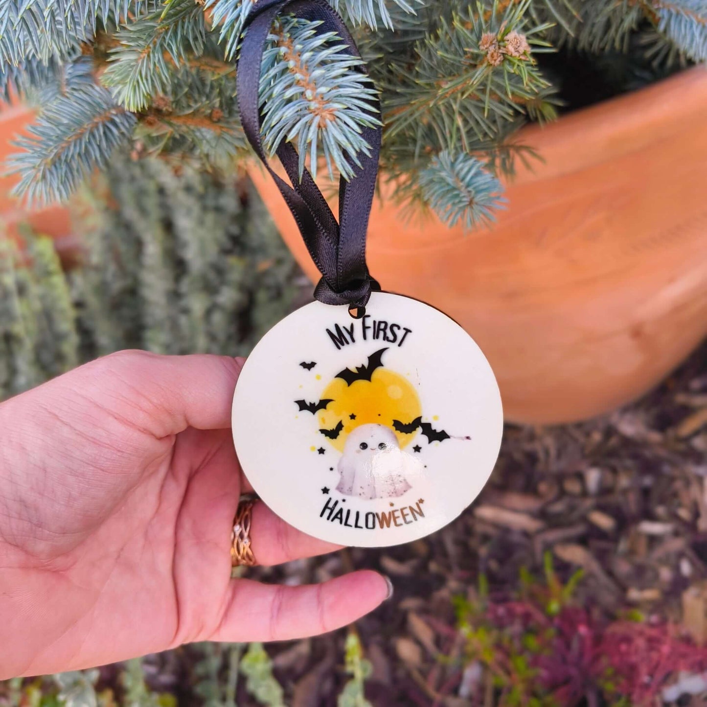 My First Halloween Ornament featuring a ghost and moon design, perfect for celebrating baby's first Halloween.