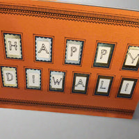 Handmade Happy Diwali card featuring colourful lettering and traditional design, perfect for the Festival of Lights.