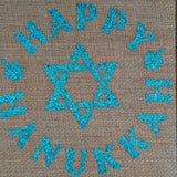 Centre view of Hanukkah drawstring gift bag with blue glitter text and festive icons