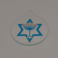 Clear acrylic Hanukkah ornament with a blue Star of David and gold menorah candles.