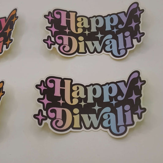 Pair of pastel “Happy Diwali” stickers with soft gradient colours and star accents displayed on a white background.