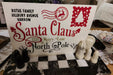 Personalised Santa Claus Envelope featuring family name and North Pole address design.