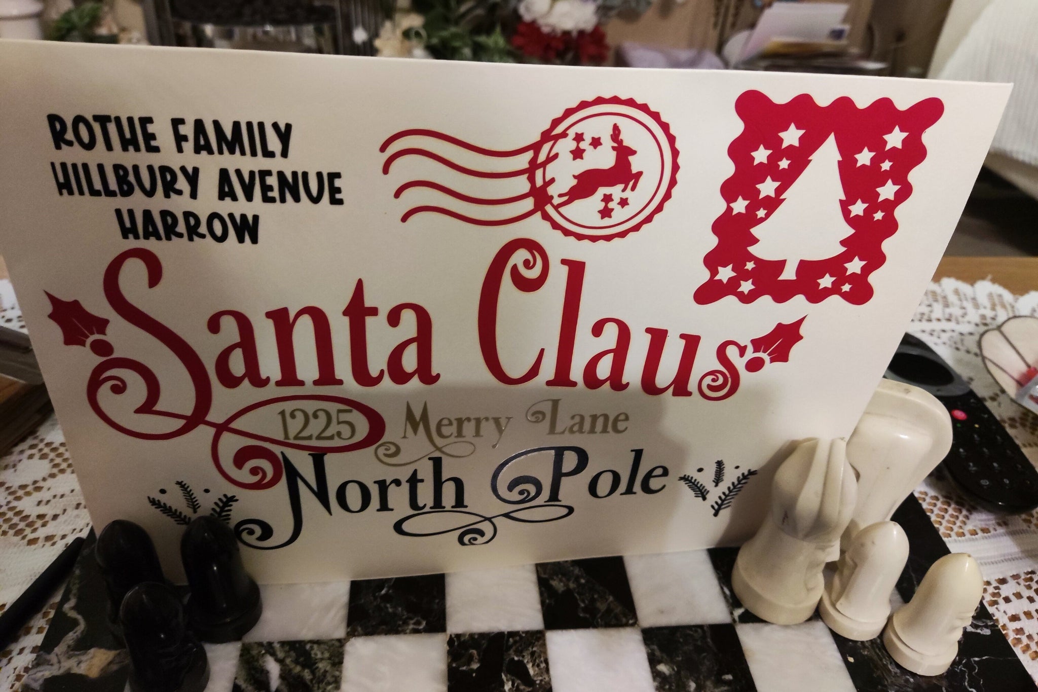 Personalised Santa Claus Envelope featuring family name and North Pole address design