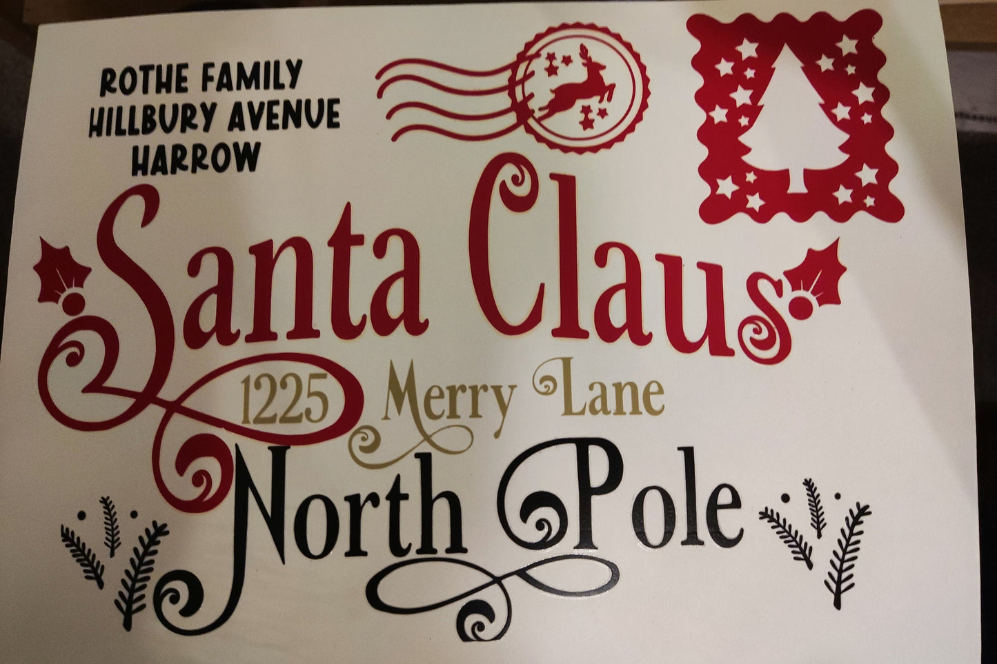 Personalised Santa Claus Envelope with family name and North Pole address design.