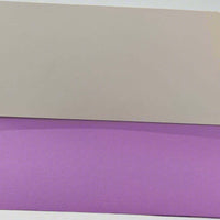 Inside view of a handmade purple money holder with a blank white insert, made from textured cardstock and displayed on a clean white background.