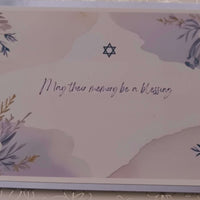 Jewish bereavement card with Star of David and floral design, featuring the message 'May their memory be a blessing' in handwritten script