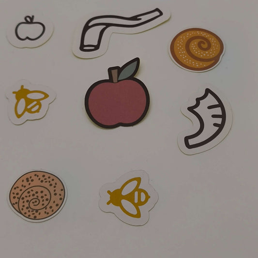 Festive sticker mix for Jewish New Year, including apple, bee, honey dipper, shofar, and sweet pastry designs.