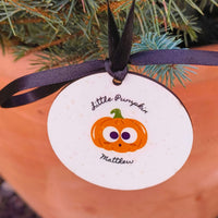 Personalised Halloween Keepsake Bauble featuring a cute pumpkin design and name 'Matthew'.