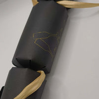 Personalised New Year cracker in black featuring gold design and ribbon, perfect for 2026 party decoration.