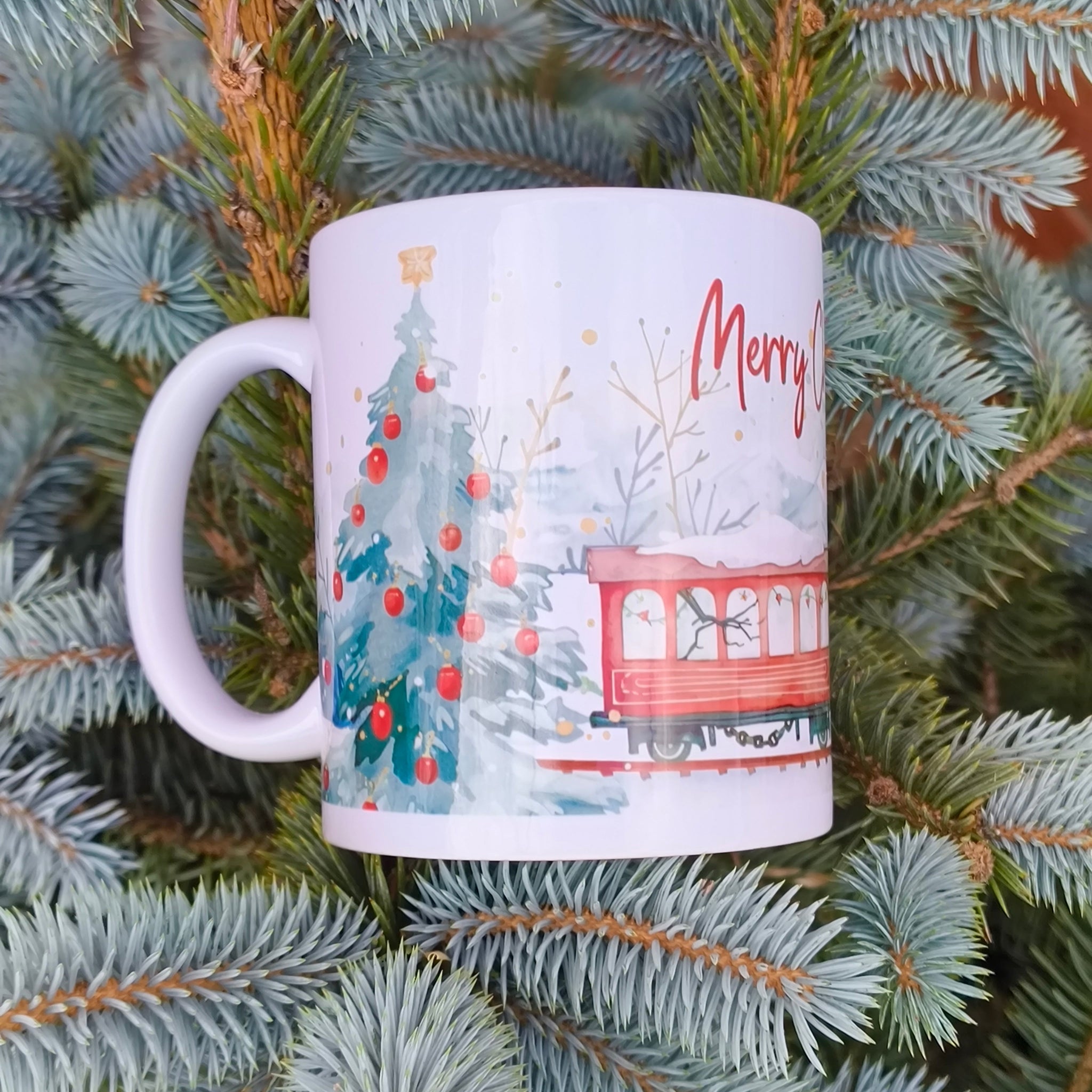 Close view of Merry Christmas mug with festive train illustration