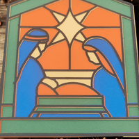 Handmade Nativity Christmas Card featuring stained glass design of Mary and Joseph, perfect for heartfelt holiday greetings.
