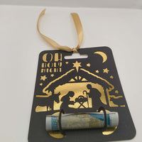 Oh Holy Night nativity money holder with gold ribbon for hanging, black card with gold design.