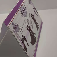 Vintage romantic greeting card featuring ballroom dancers in elegant attire and chandeliers.