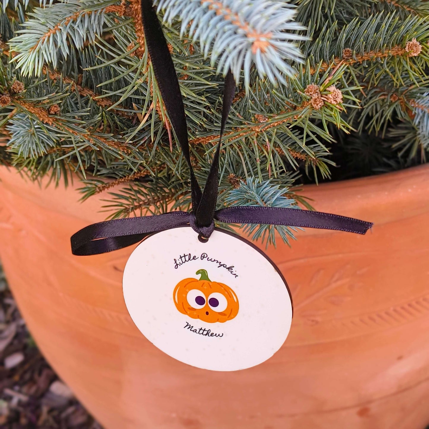 Personalised Halloween Keepsake Bauble featuring a cute pumpkin design with the name Matthew.